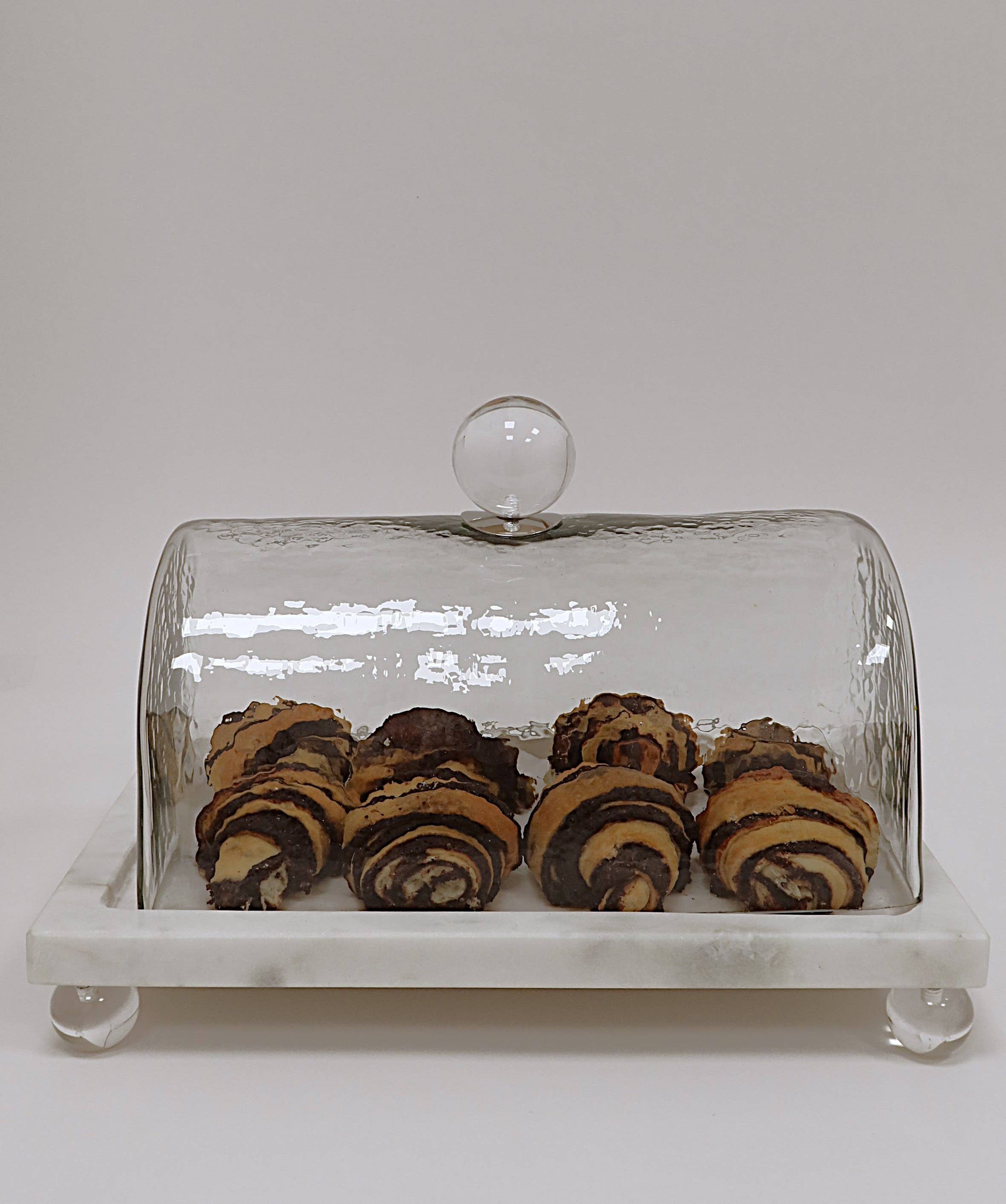 White marble cake platter with glass dome cover