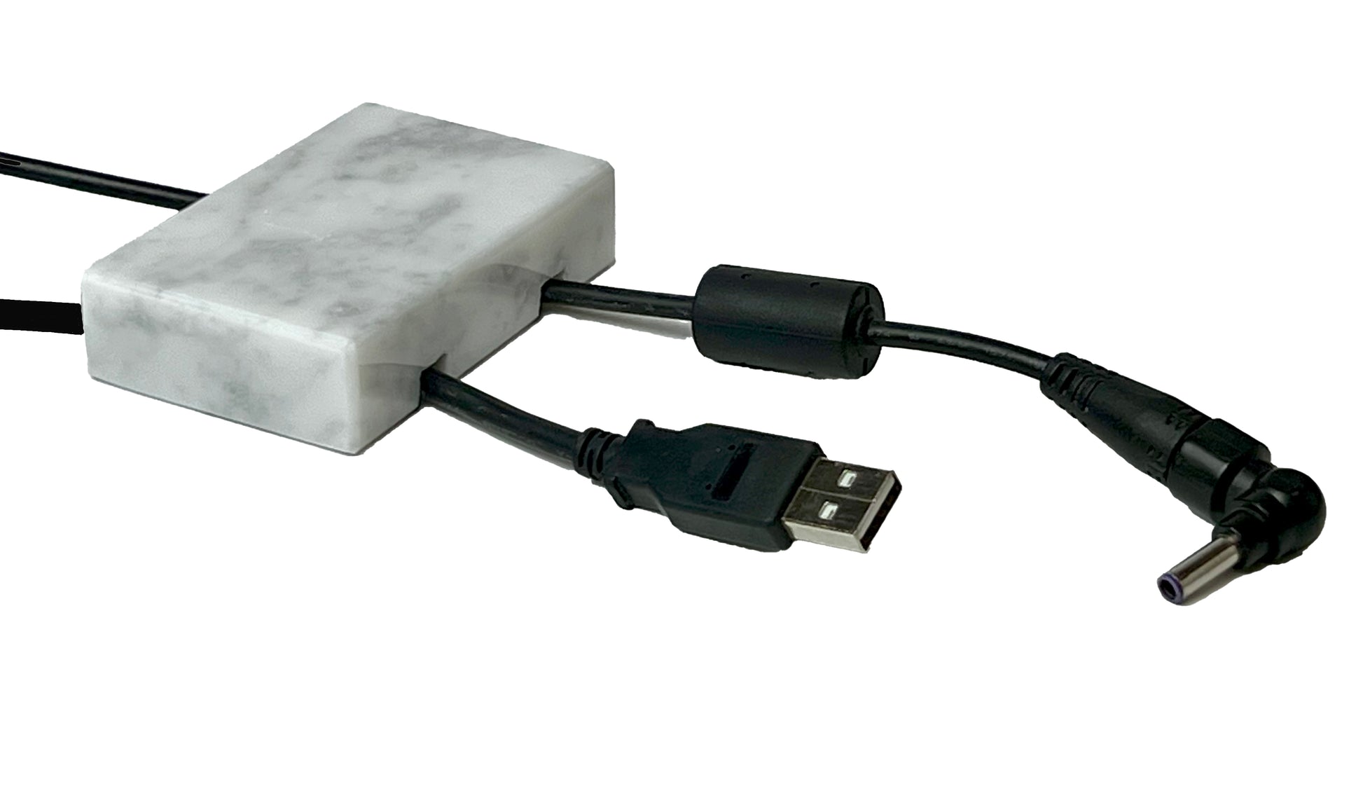 White Carrara Marble cord organizer with polished finish, double-cable slot