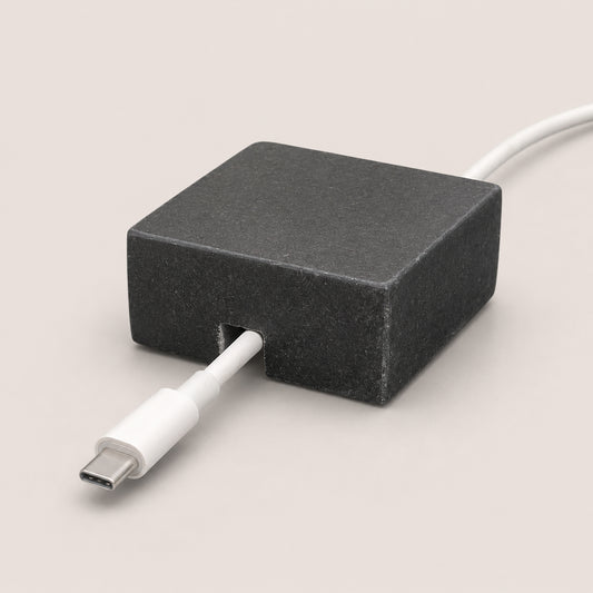 Black Granite cord organizer with honed finish, single-cable slot