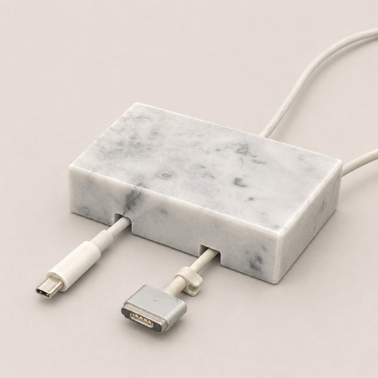 White Carrara Marble cord organizer with polished finish, double-cable slot