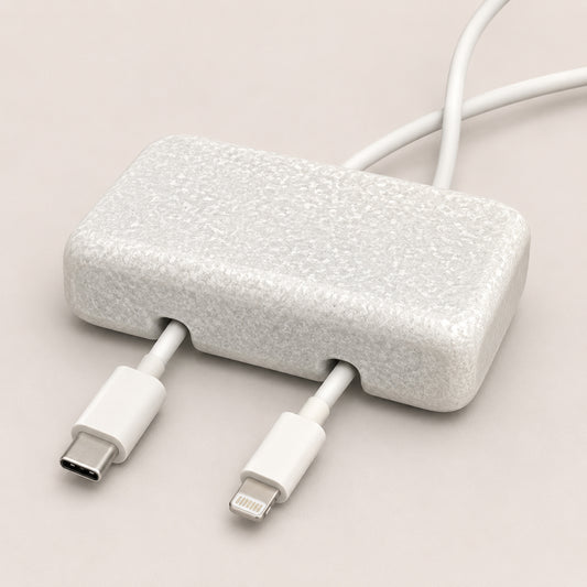 White Carrara Marble cord organizer with tumbled finish, double-cable slot
