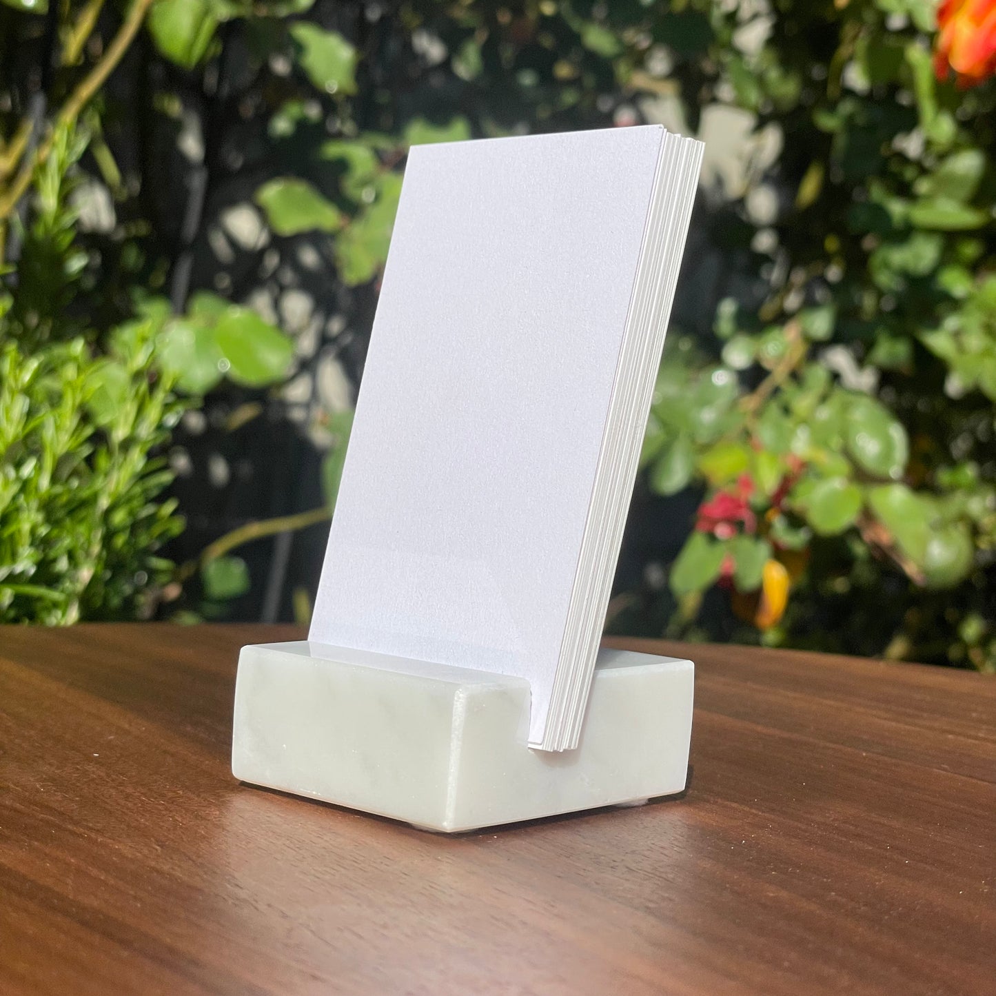 White Carrara Marble vertical business card holder on desk
