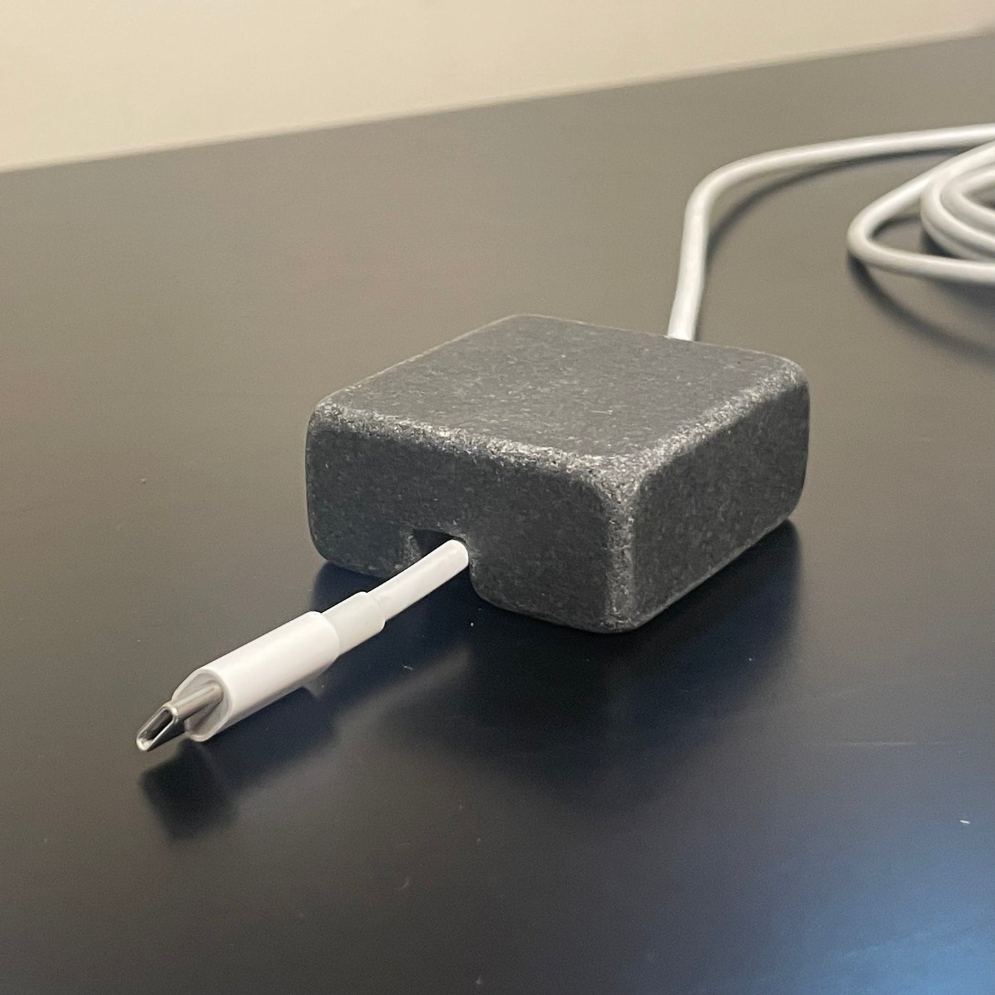 Black Granite Cord Organizer — Tumbled · Single