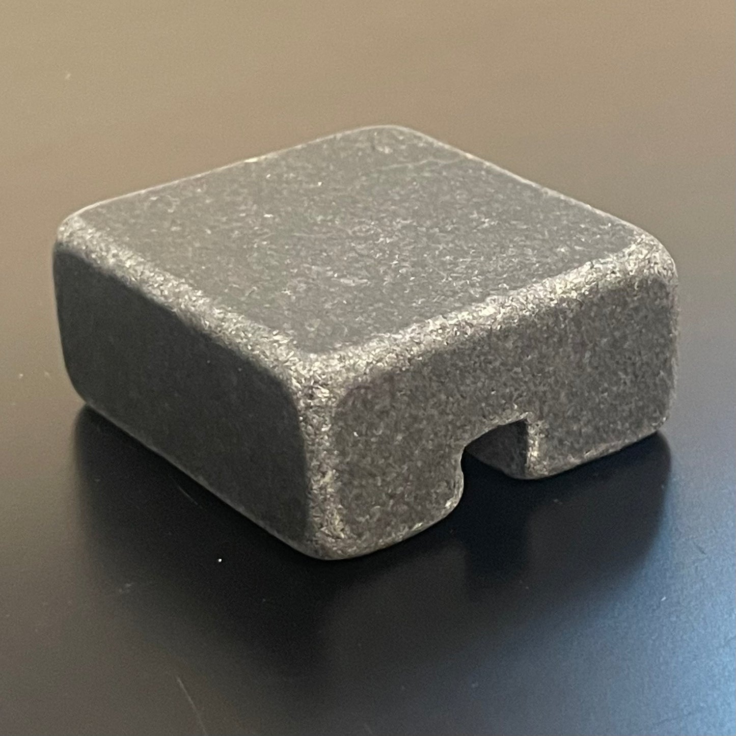 Black Granite Cord Organizer — Tumbled · Single