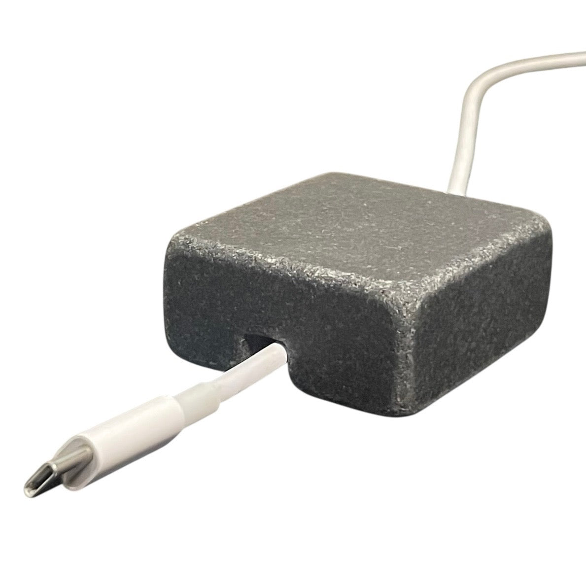 Black Granite cord organizer with tumbled finish, single-cable slot