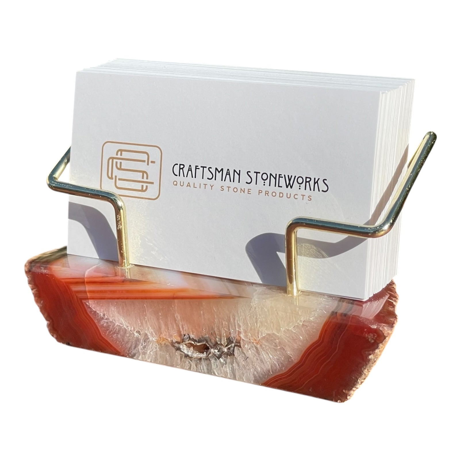 Red agate business card holder with gold wire frame
