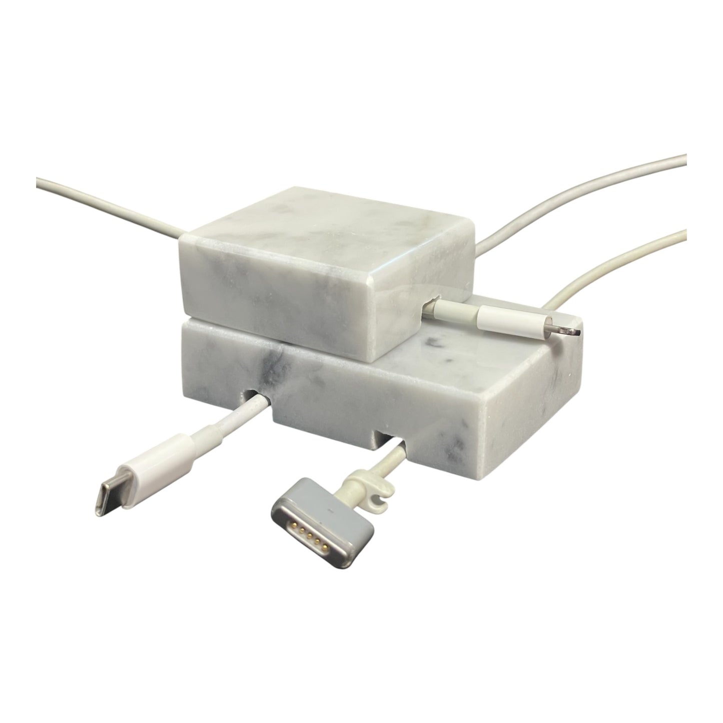 White Carrara Marble cord organizer with polished finish, single-cable slot