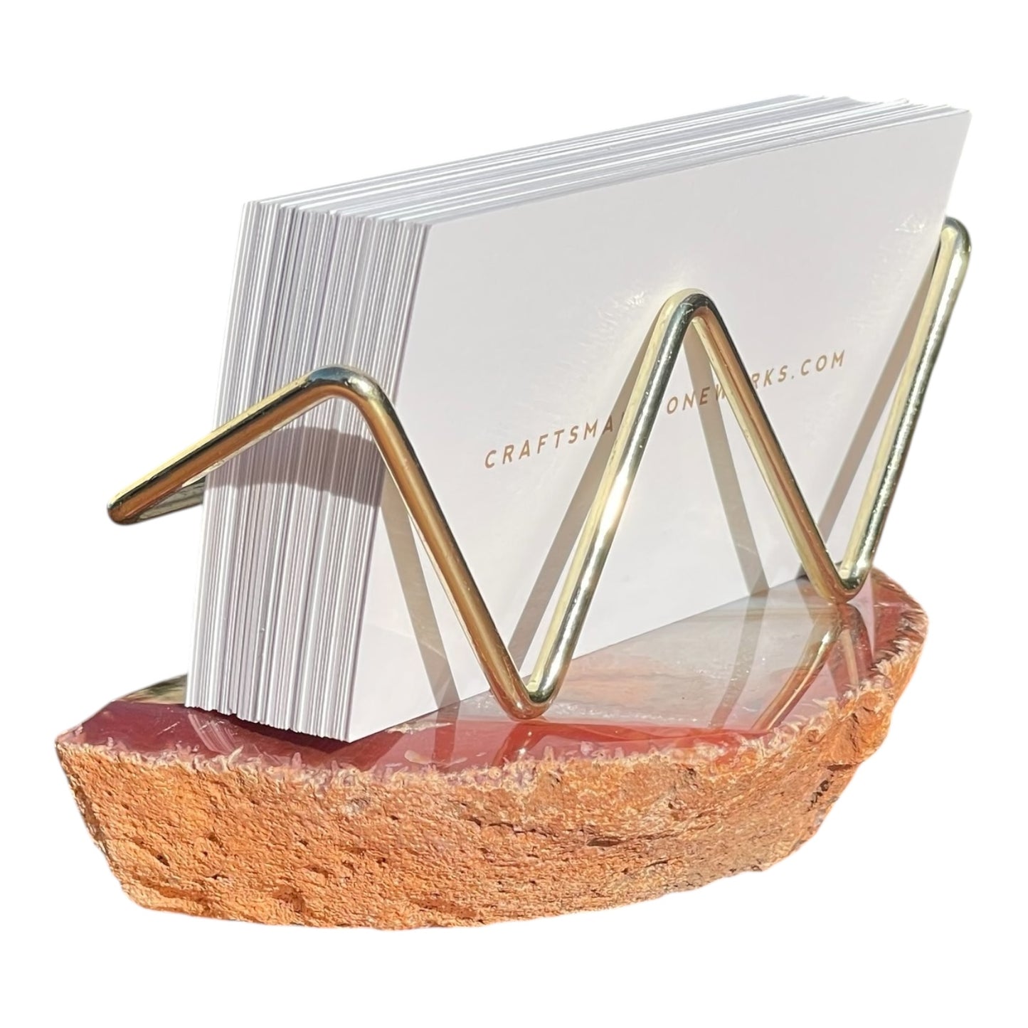 Red agate business card holder with gold wire frame
