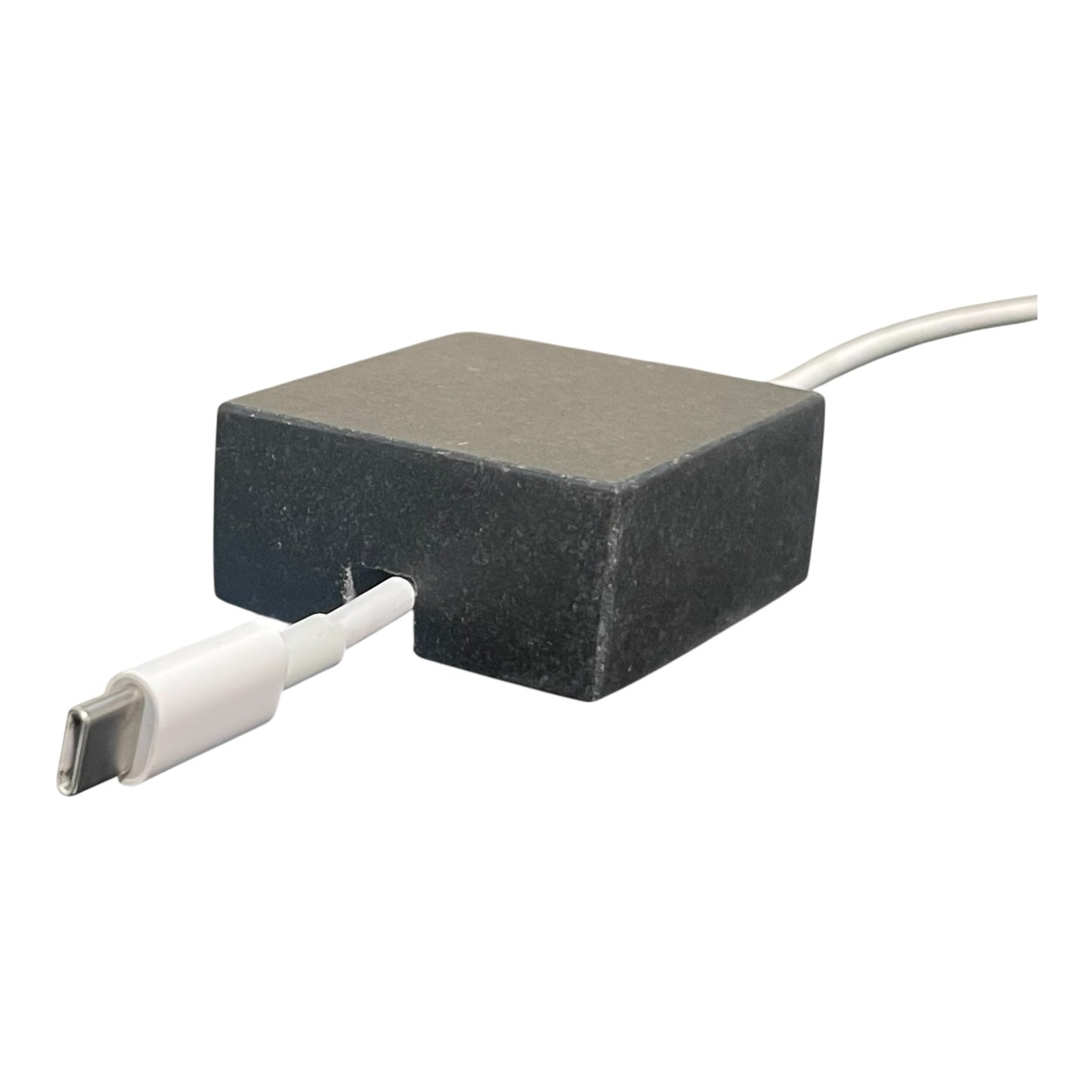 Black Granite cord organizer with honed finish, single-cable slot