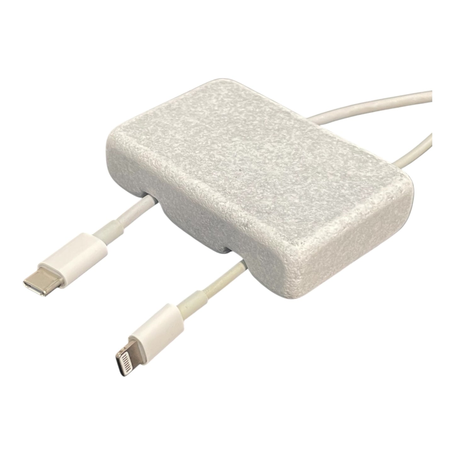 White Carrara Marble cord organizer with tumbled finish, double-cable slot
