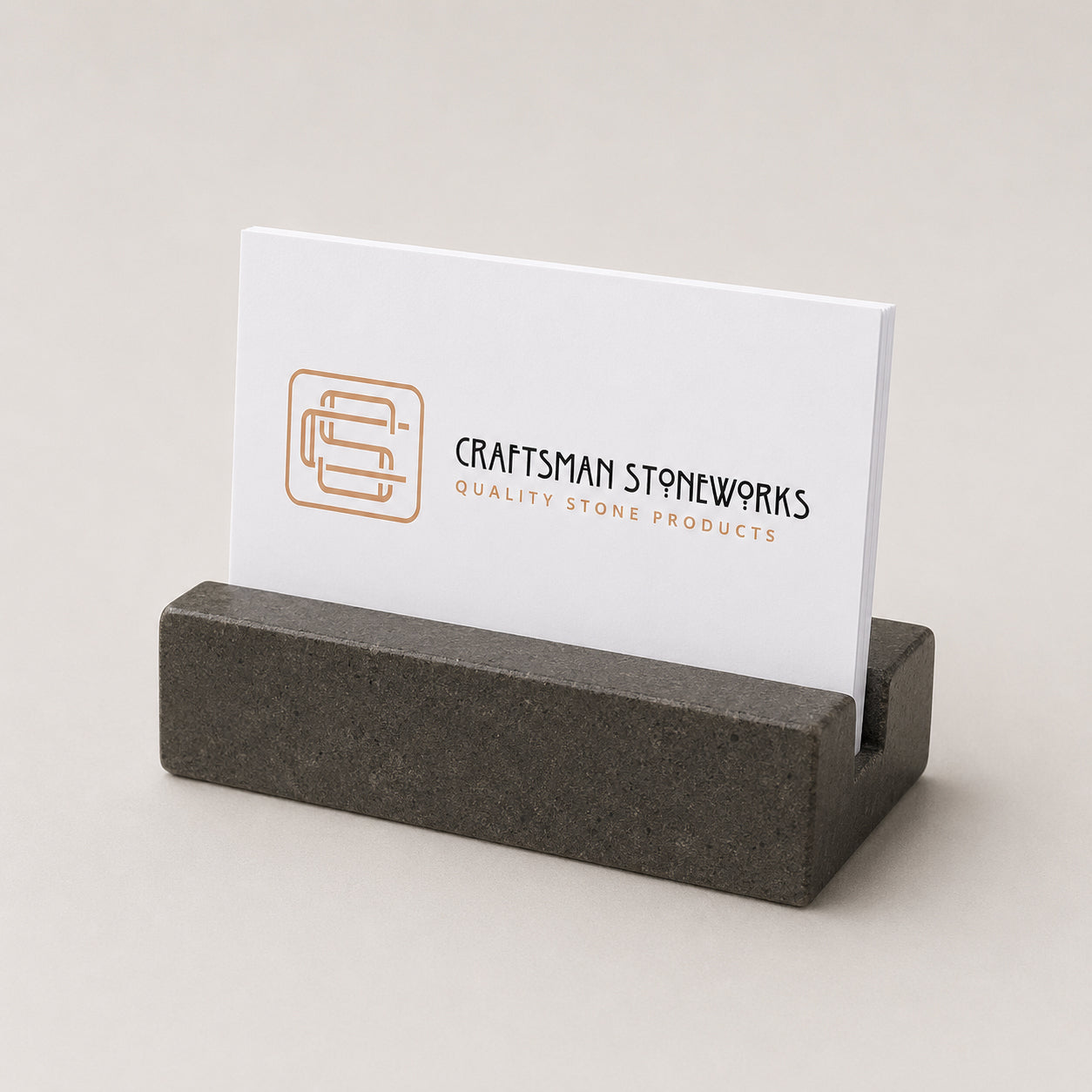 Black Absolute Granite business card holder on desk