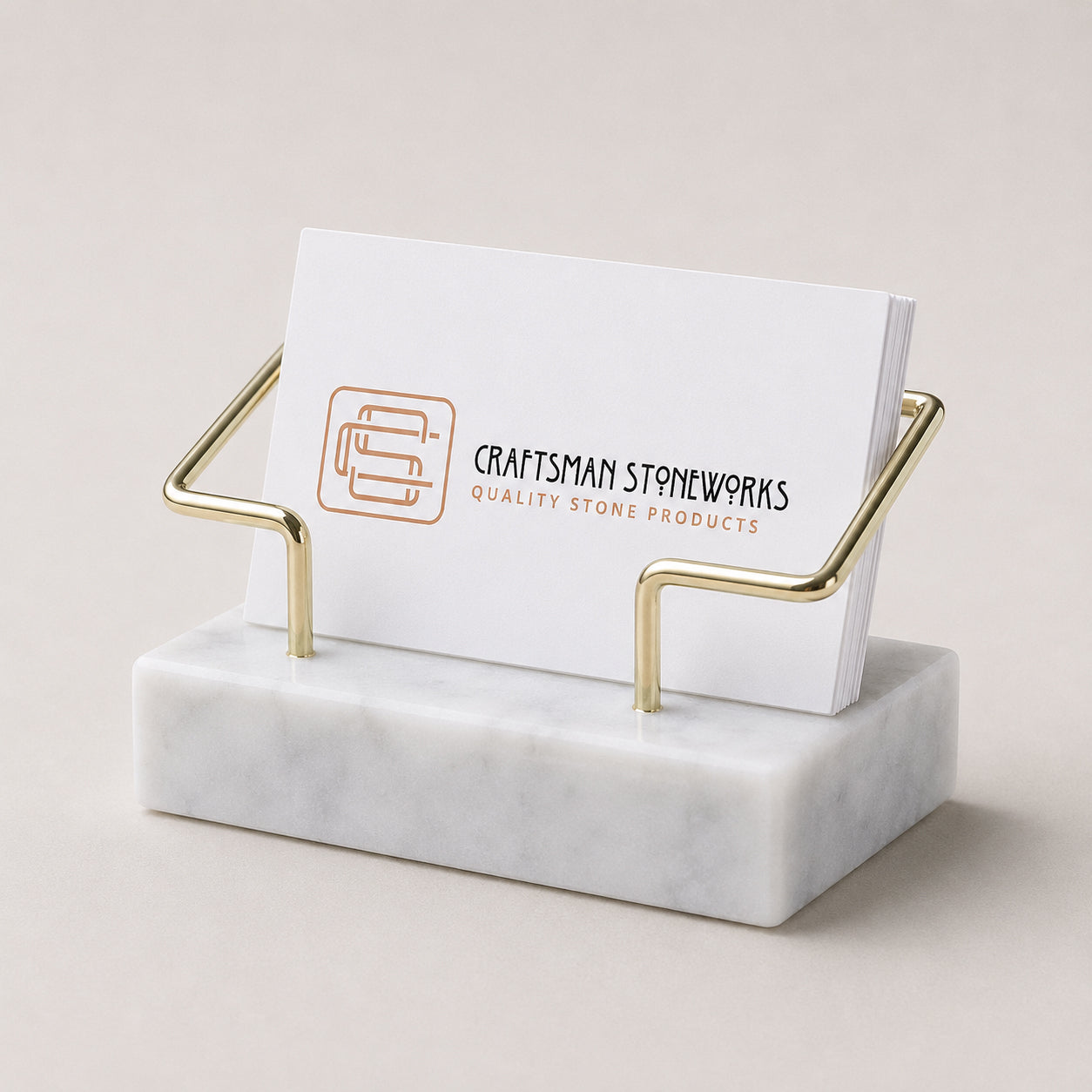 White marble business card holder with gold wire frame