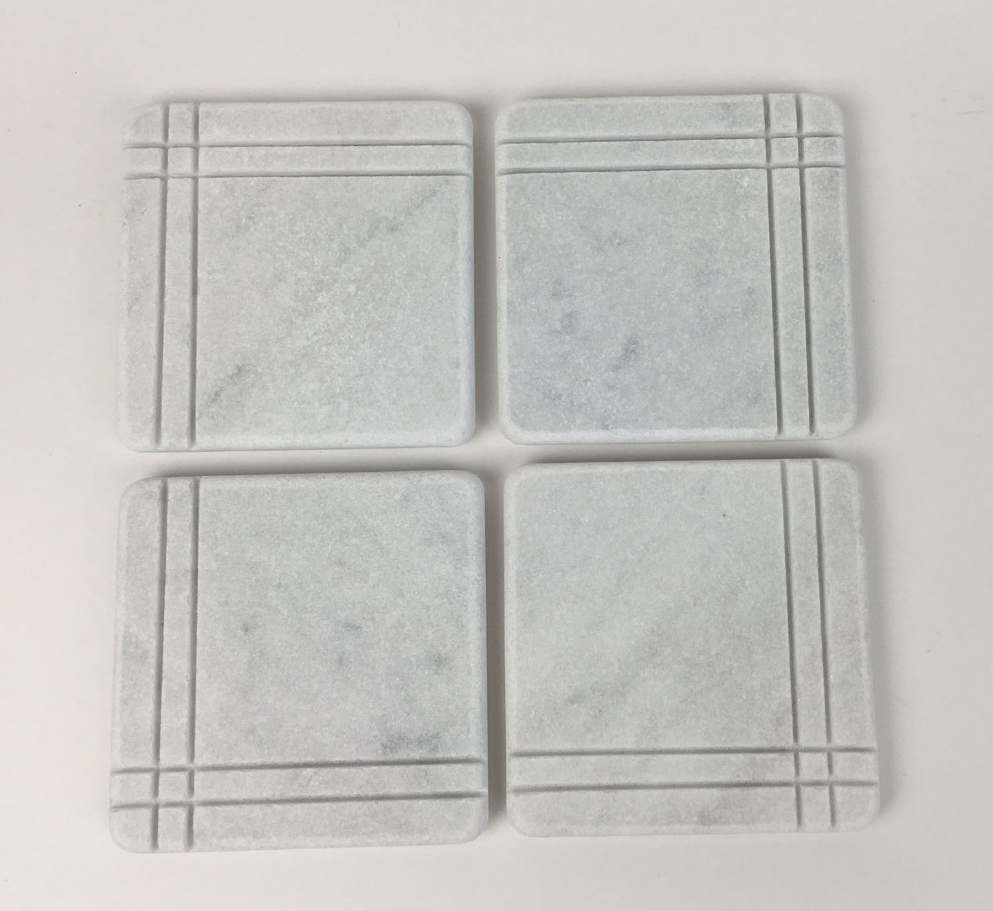 White Carrara Marble coaster with hand-carved linear border, Design A