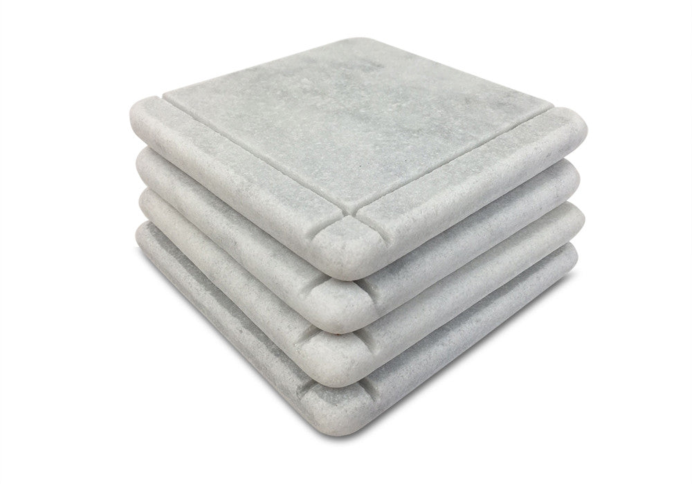 White Carrara Marble coaster with subtle hand-carved accent line, Design C