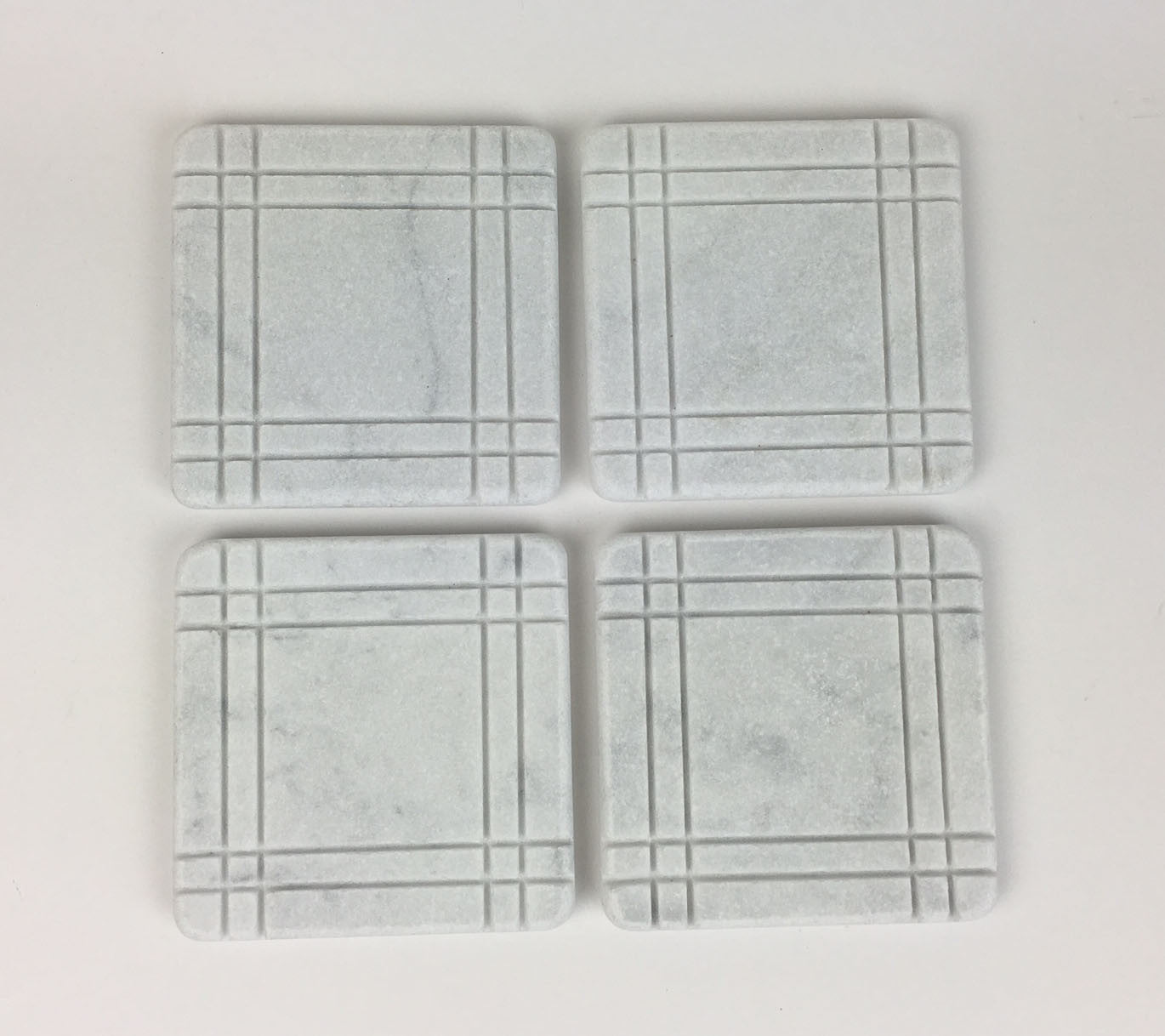 White Carrara Marble coaster with hand-carved frame border, Design B